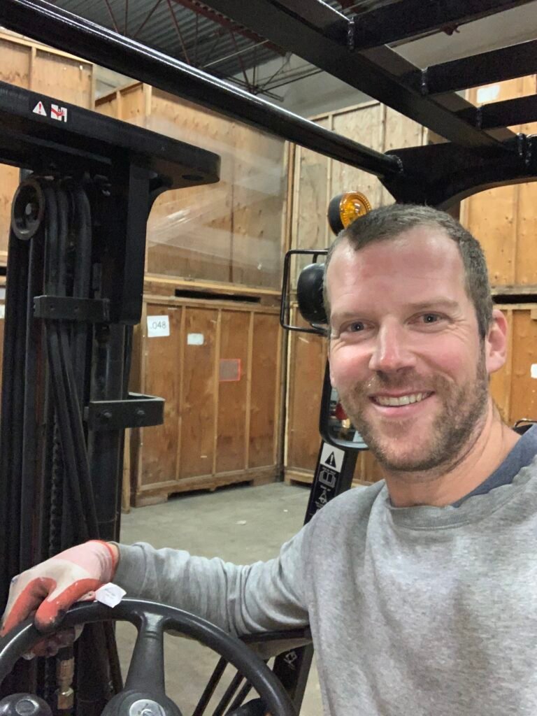 Jon on forklift